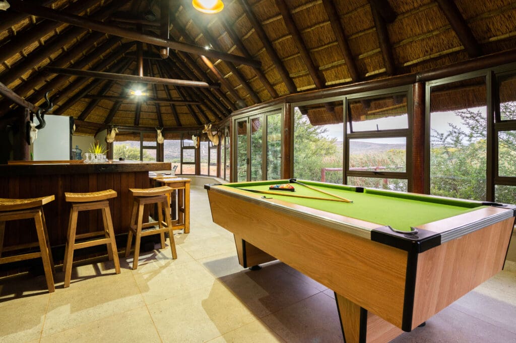 Entertainment area featuring a pool table for guest enjoyment.